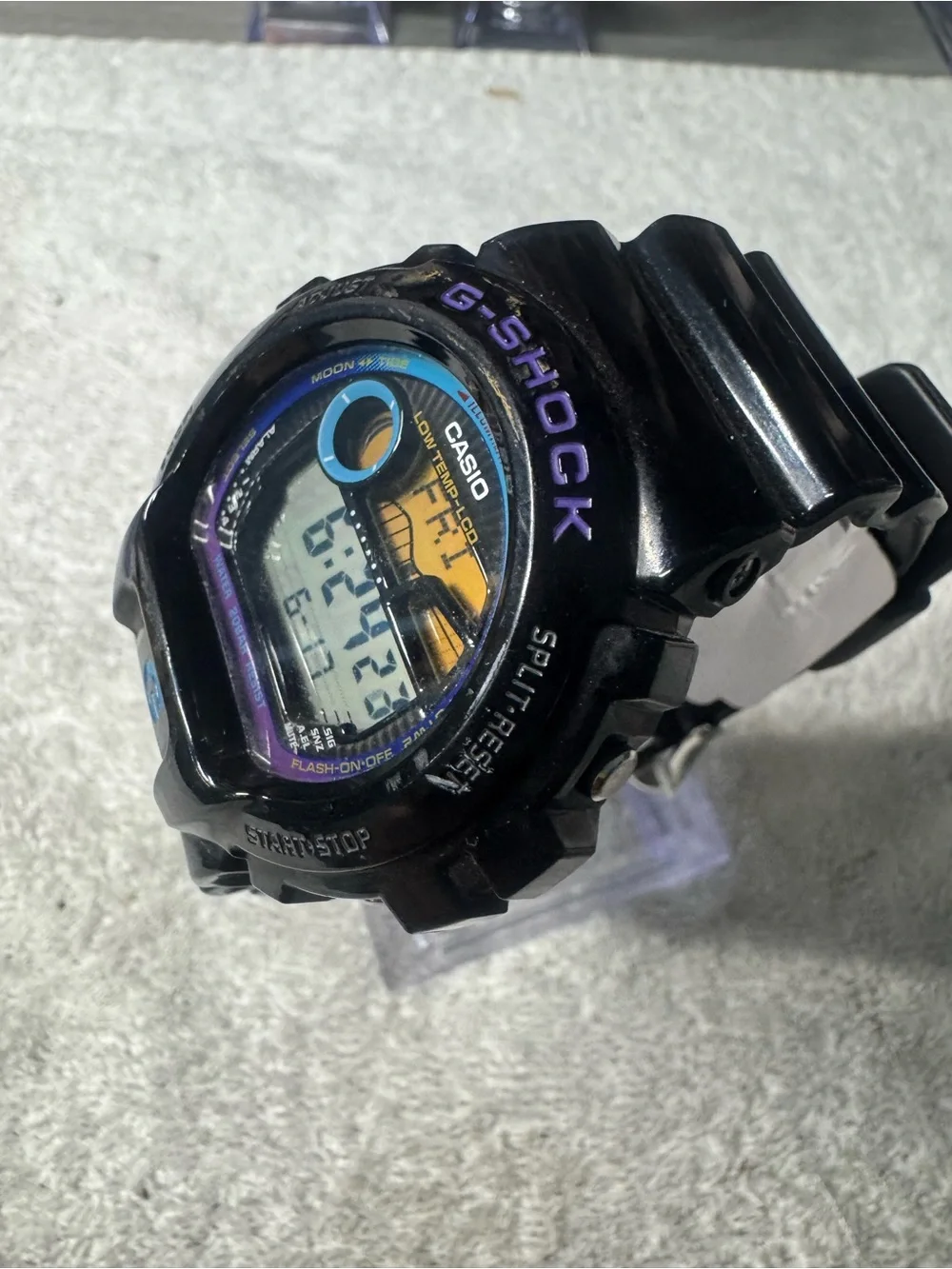 Casio Black G-Shock Watch with Blue and Purple Accents